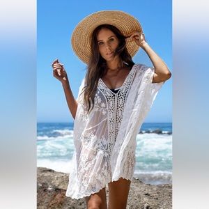NWT White Lace Crochet Cover Up. One size.